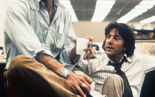 Robert Redford (left) in a button-down shirt and Dustin Hoffman (right) in "All President's Men", 1976. Image through Everett Collection.