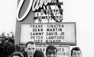 Peter Lawford, Frank Sinatra, Sammy Davis Jr., Dean Martin from the Rat Pack posed on the Summit at Sands Hotel in Las Vegas, February 1960. Photo by Bob Willoughby/Redferns.