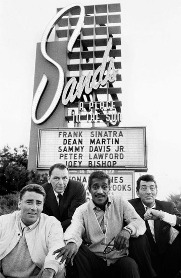 Peter Lawford, Frank Sinatra, Sammy Davis Jr., Dean Martin from the Rat Pack posed on the Summit at Sands Hotel in Las Vegas, February 1960. Photo by Bob Willoughby/Redferns.
